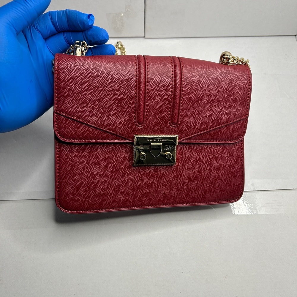 Charles & Keith Red and Gold Crossbody Bag with Structured Design